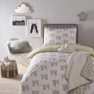 Kids bedroom with white animal printed bed