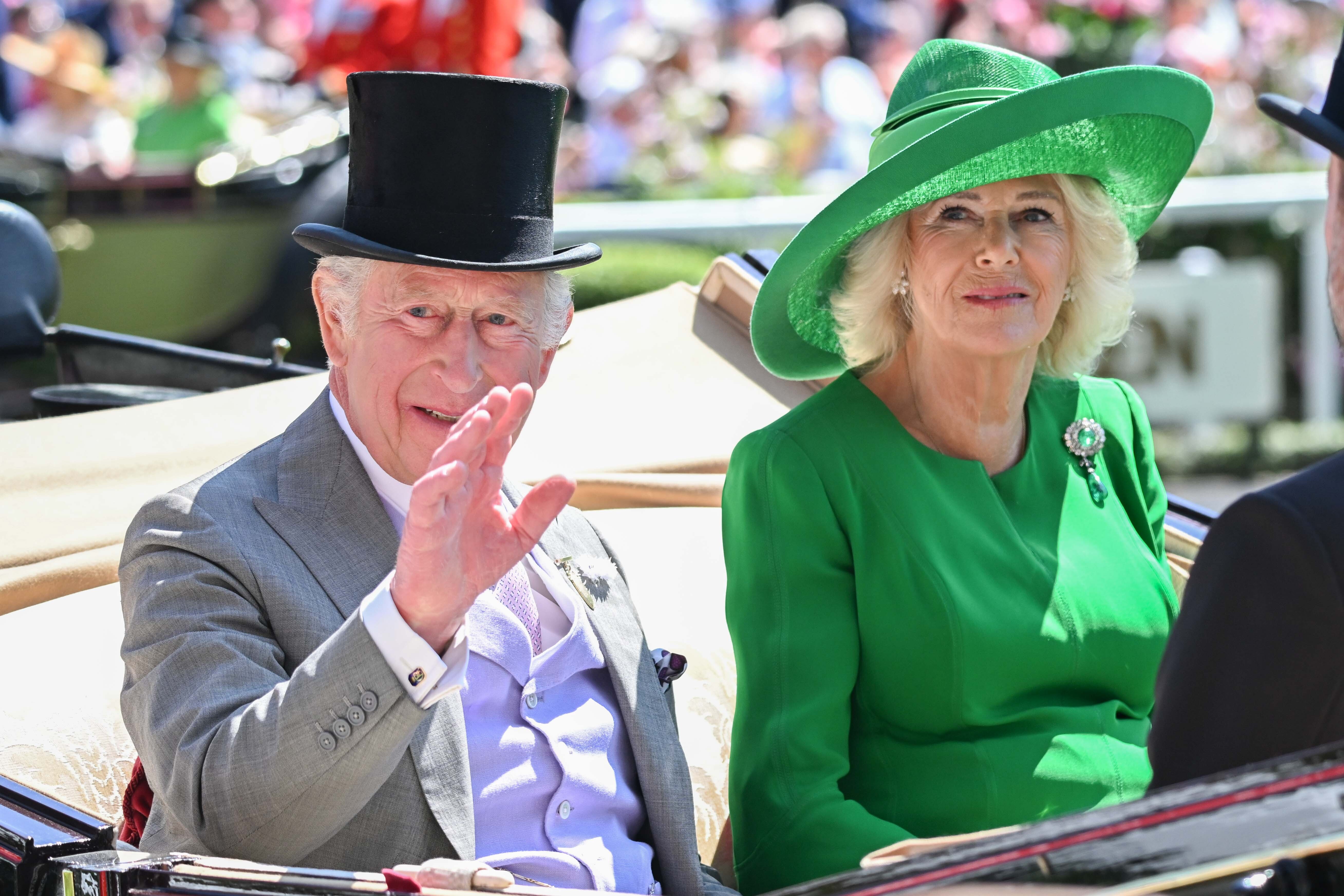 King Charles and Queen Camilla arrive at Royal Ascot on June 18, 2025, with Camilla wearing a green dress and matching hat with Queen Elizabeth II's emerald brooch