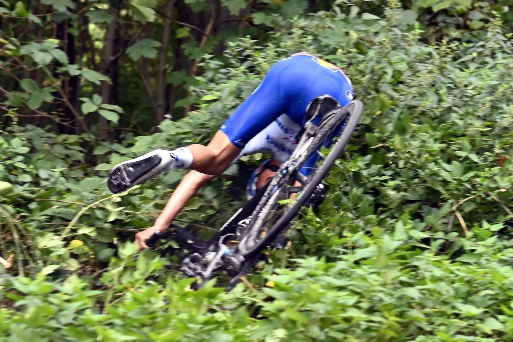 Belgian rider Mauri Vansevenant of Deceuninck QuickStep crashes during the 84th edition of the mens one day cycling race race La Fleche Wallonne Waalse Pijl Walloon Arrow 220kms from Ans to Huy on September 30 2020 Switzerlands Marc Hirschi of Team Sunweb was the victor as the 2020 edition was postponed from April to September due to the ongoing Coronavirus Covid19 pandemic Photo by ERIC LALMAND BELGA AFP Belgium OUT Photo by ERIC LALMANDBELGAAFP via Getty Images