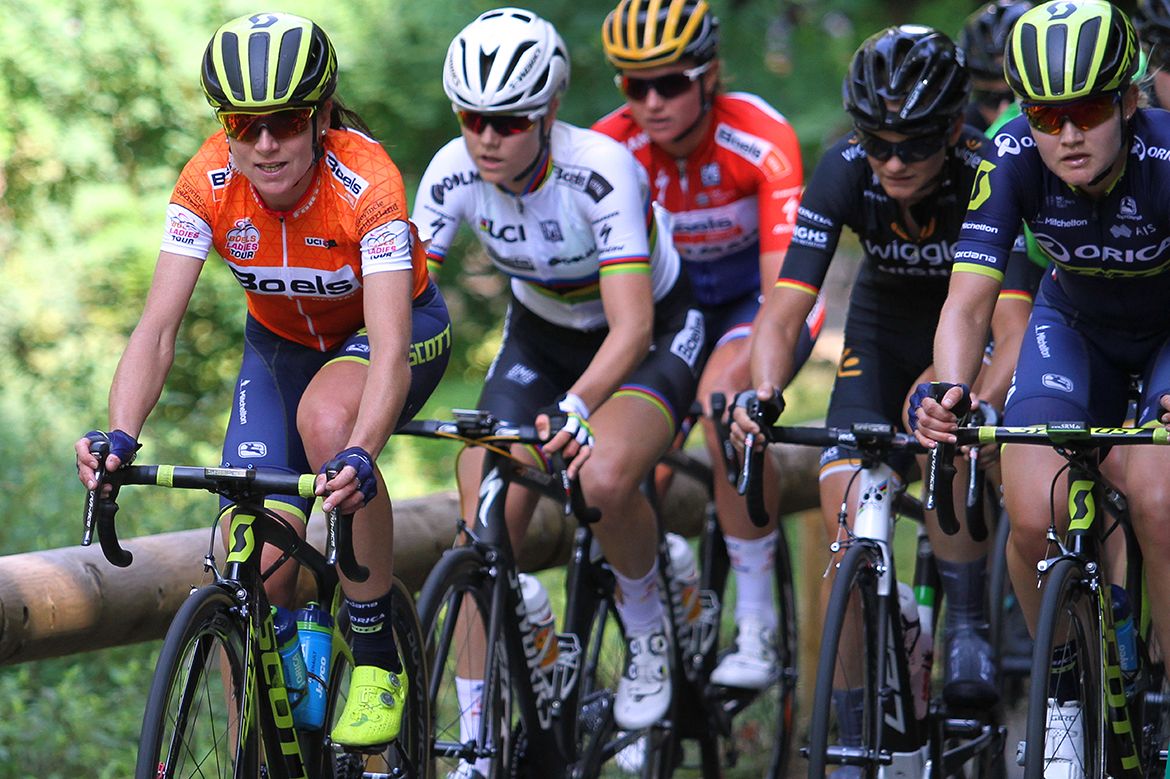 Annemiek van Vleuten in the orange Boels Ladies Tour leader's jersey in select company on stage 5