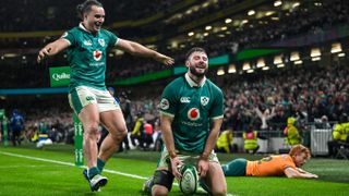 Robbie Henshaw of Ireland celebrates with teammate James Lowe, left, after scoring their side's sixth try during the Quilter Nations Series 2025 match between Ireland and Australia at the Aviva Stadium in Dublin ahead of Ireland vs South Africa.