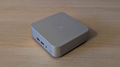 The Geekom A8 AI mini PC on a desk