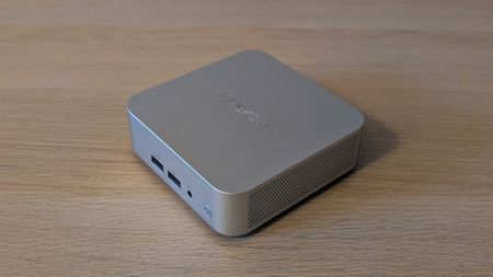 The Geekom A8 AI mini PC on a desk