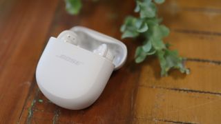 The Bose QuietComfort Ultra earbuds in white