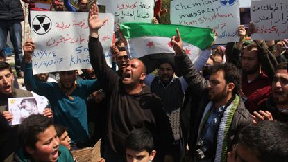 Syrian residents of Khan Sheikhun protest