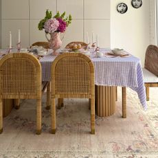 Ruggable pink antique rug in a dining room