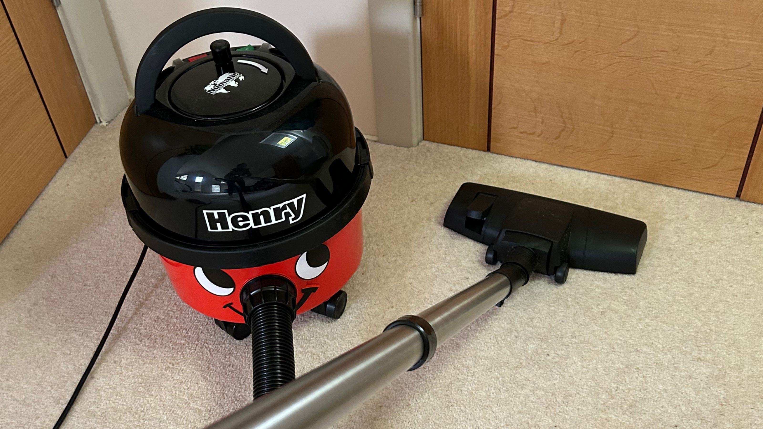 Henry xtra and vacuum head on beige carpet