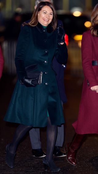 Carole Middleton wears a green coat as she arrives for the Together at Christmas carol service in 2022