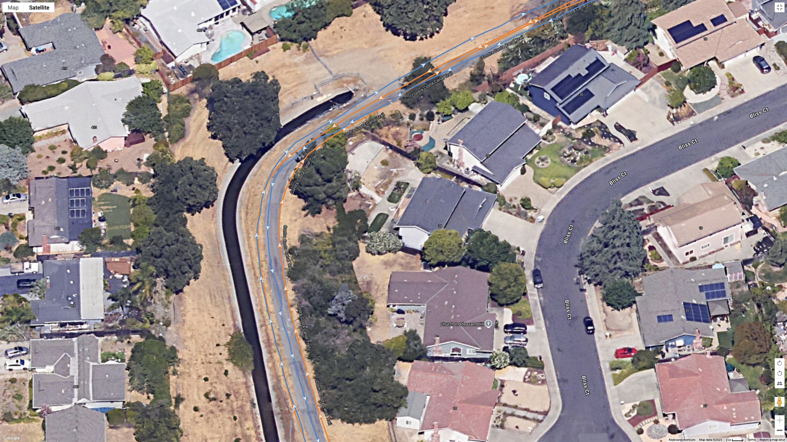 A Google Maps top-down view showing a GPS line for the COROS PACE Pro (orange) and Garmin Fenix 8 (blue)