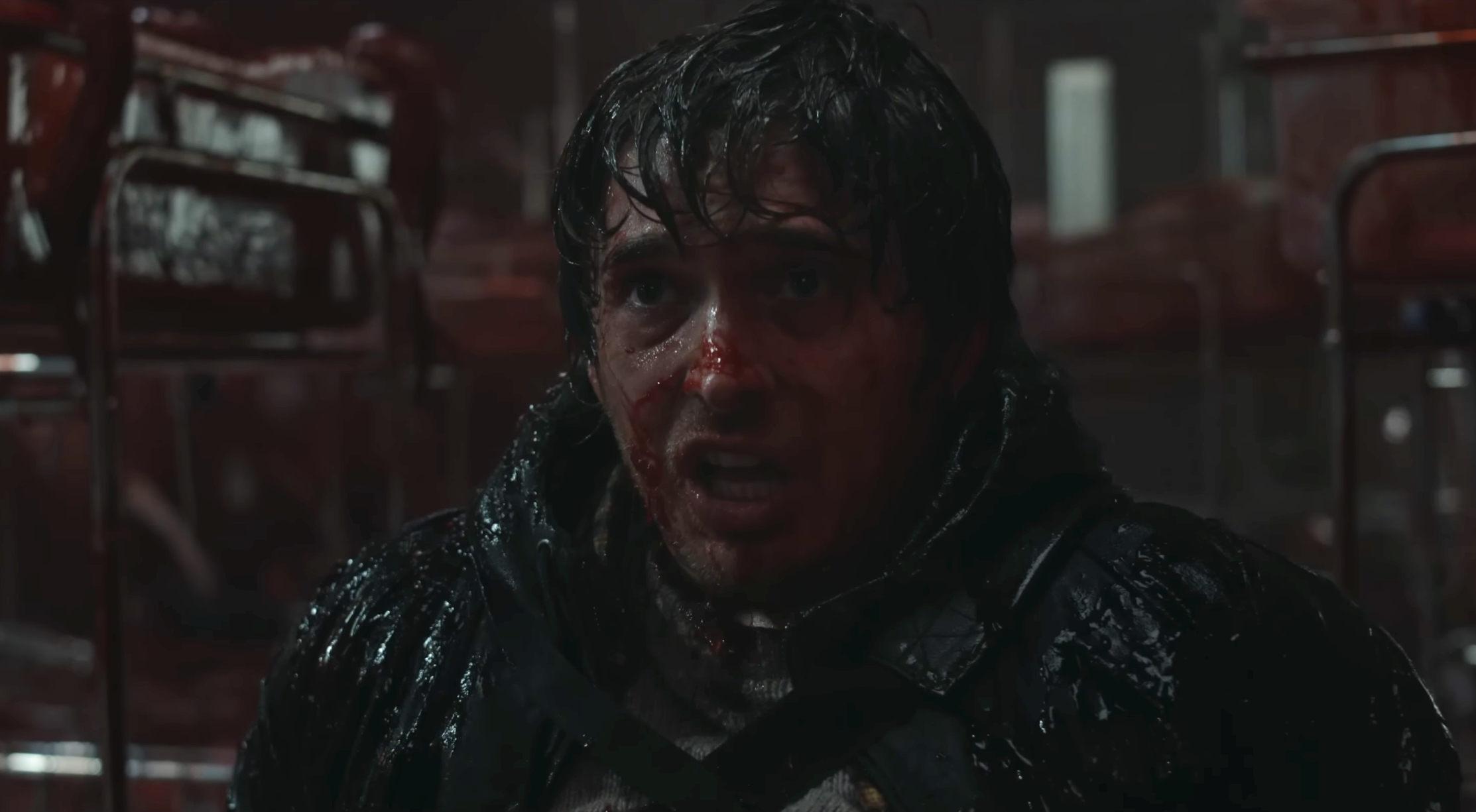Bryan covered in blood sitting on maternity ward floor in Resident Evil (2026)