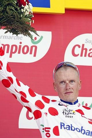 Michael Rasmussen (Rabobank) celebrating another polka dot, which he doesn't get to wear because yellow goes first and it's too hot for two jerseys anyway.