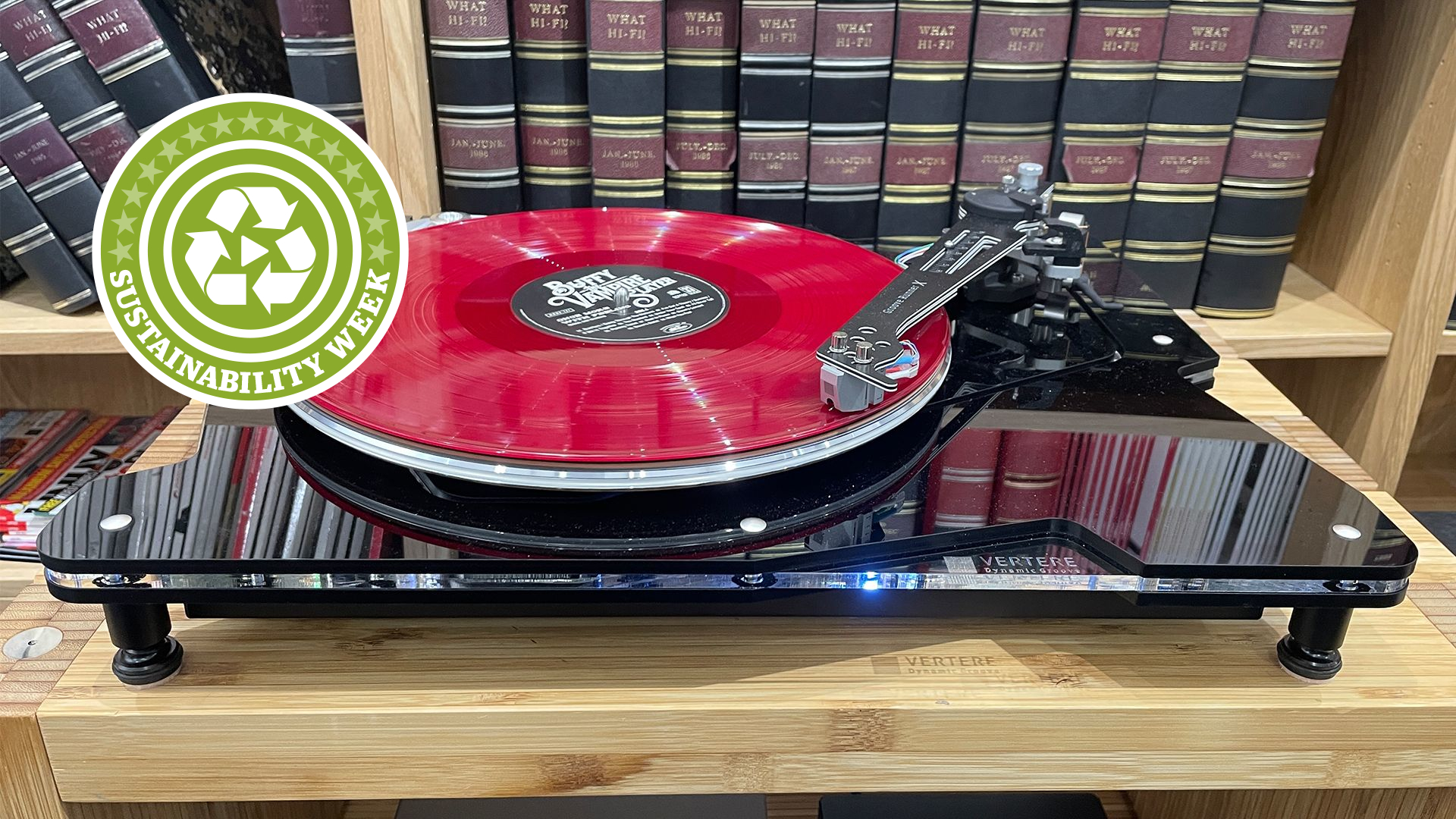 Turntable on desk with Sustainability Week logo