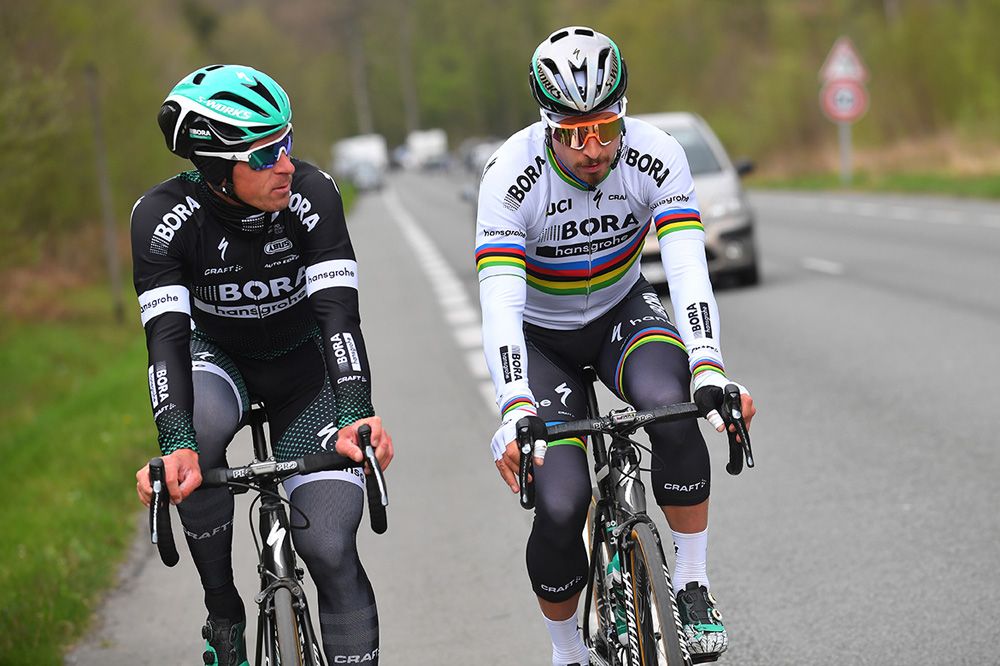 Peter Sagan talks with teammate Maciej Bodnar