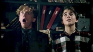 Anthony Michael Hall and Ilan Mitchell-Smith looking up in shock in Weird Science