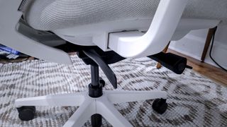 The levers for forward tilt and tilt tension on the Branch Ergonomic Chair Pro