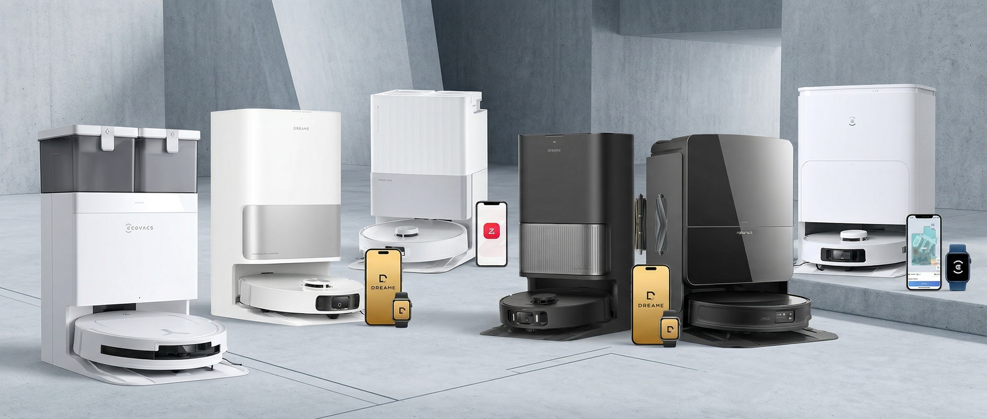 Several robot vacuums and docking stations in a concrete room