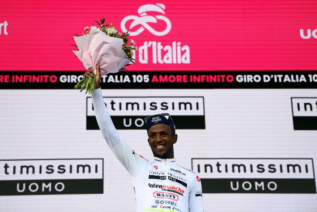 VISEGRAD HUNGARY MAY 06 Hailu Biniam Girmay of Eritrea and Team Intermarch Wanty Gobert Matriaux celebrates at podium as white best young rider winner during the 105th Giro dItalia 2022 Stage 1 a 195km stage from Budapest to Visegrd 337m Giro WorldTour on May 06 2022 in Visegrad Hungary Photo by Tim de WaeleGetty Images