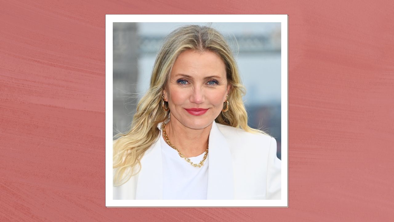 Cameron Diaz is pictured wearing a white blazer and t-shirt whilst attending the photocall for &quot;Back In Action&quot; at Cheval Three Quays on January 17, 2025 in London, England/ in a muted red template