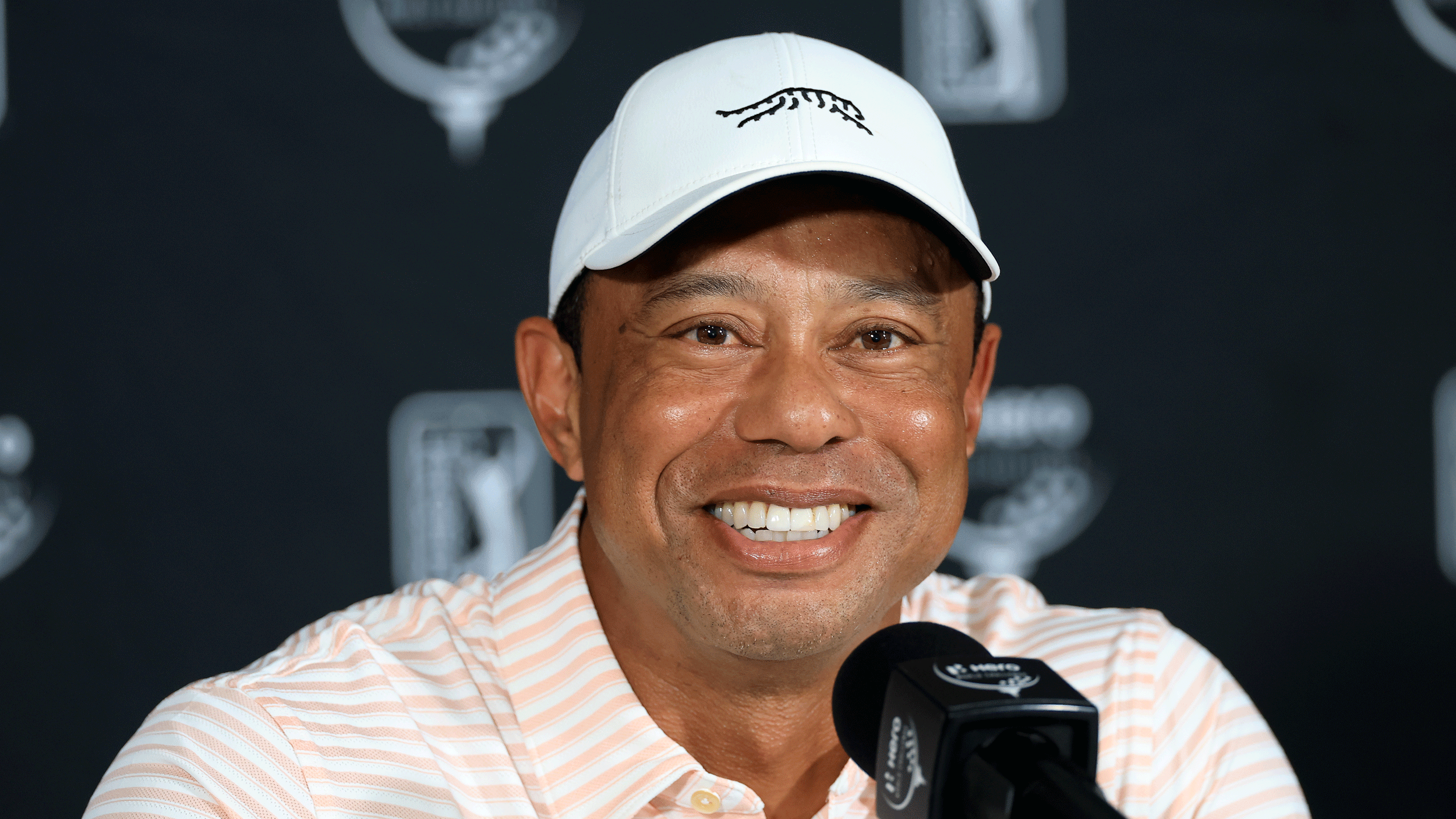 Tiger Woods smiles during his 2025 Hero World Challenge pre-tournament press conference