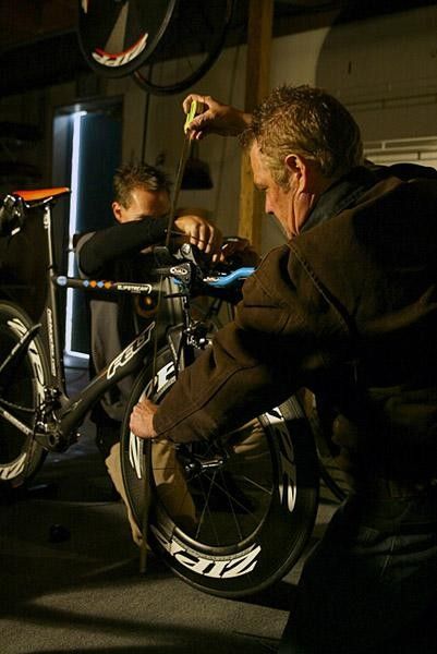 This is service, as the guy with his name on the bike makes sure everything measures up.