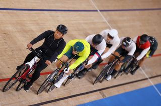 A pacer is seen leading the race prior to the start ahead of Matthew Glaetzer of Team Australia during the men's Keirin quarterfinals heat 3 of the track cycling on day sixteen of the Tokyo 2020 Olympic Games 