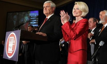 Newt Gingrich celebrates his homestate win in Georgia Tuesday night.