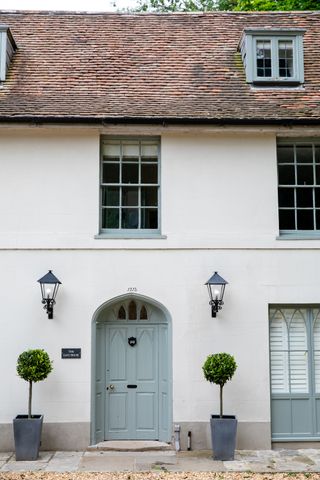 house exterior with farrow & ball pigeon on door and window trims