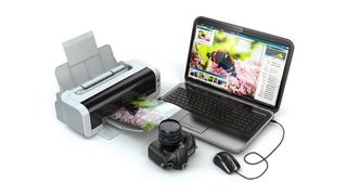 The best art printers are represented by a photo of a printer next to a camera and computer