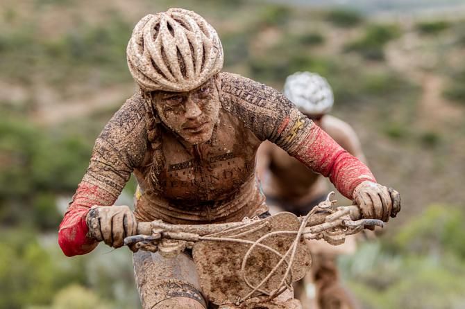 A muddy rider during stage 2 of the Cape Epic