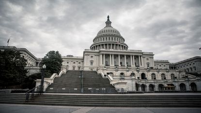 picture of Capitol building with dark clouds