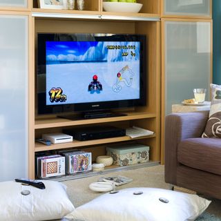 games room with television and sofa