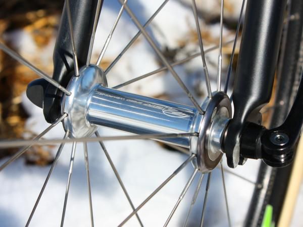 Zipp's new hubs use more widely spaced flanges and user-adjustable bearing preload.