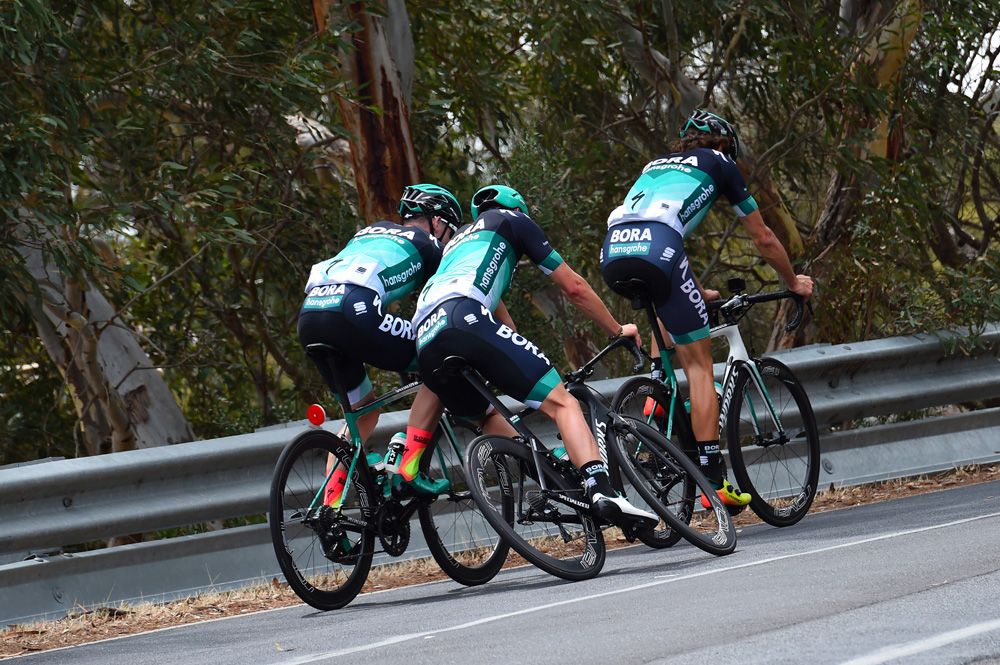 Two Bora-hansgrohe rider avoid a crash