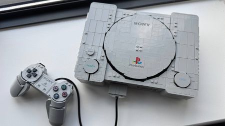 Lego PlayStation model on a window stool