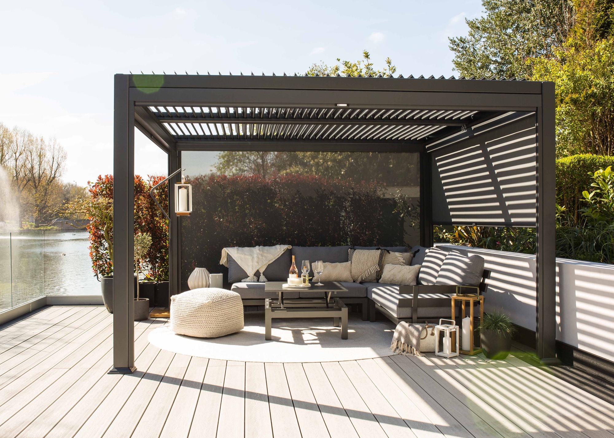 Aluminium louvred roofed pergola on a timber deck