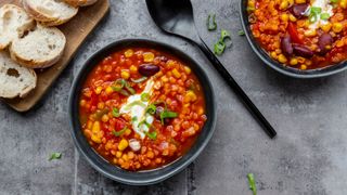 bowl of bean chili with sour cream