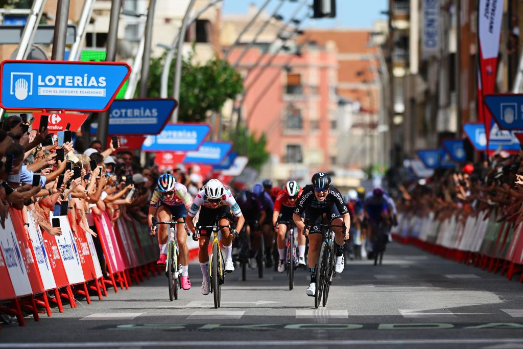 PILAR DE LA HORADADA SPAIN MAY 02 LR Chlo Dygert of The United States and Team CanyonSRAM Racing Marianne Vos of The Netherlands and Team JumboVisma Polka dot Mountain Jersey and Charlotte Kool of The Netherlands and Team DSM sprint at finish line during the 9th La Vuelta Femenina 2023 Stage 2 a 1058km stage from Orihuela to Pilar de la Horadada UCIWWT on May 02 2023 in Pilar de la Horadada Spain Photo by Dario BelingheriGetty Images