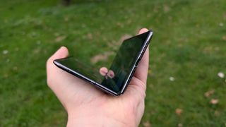 xiaomi mix fold 4 review images showing off the phone from multiple angles