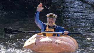 Man dressed as Popeye paddling down Australian river in a giant pumpkin called Tormund