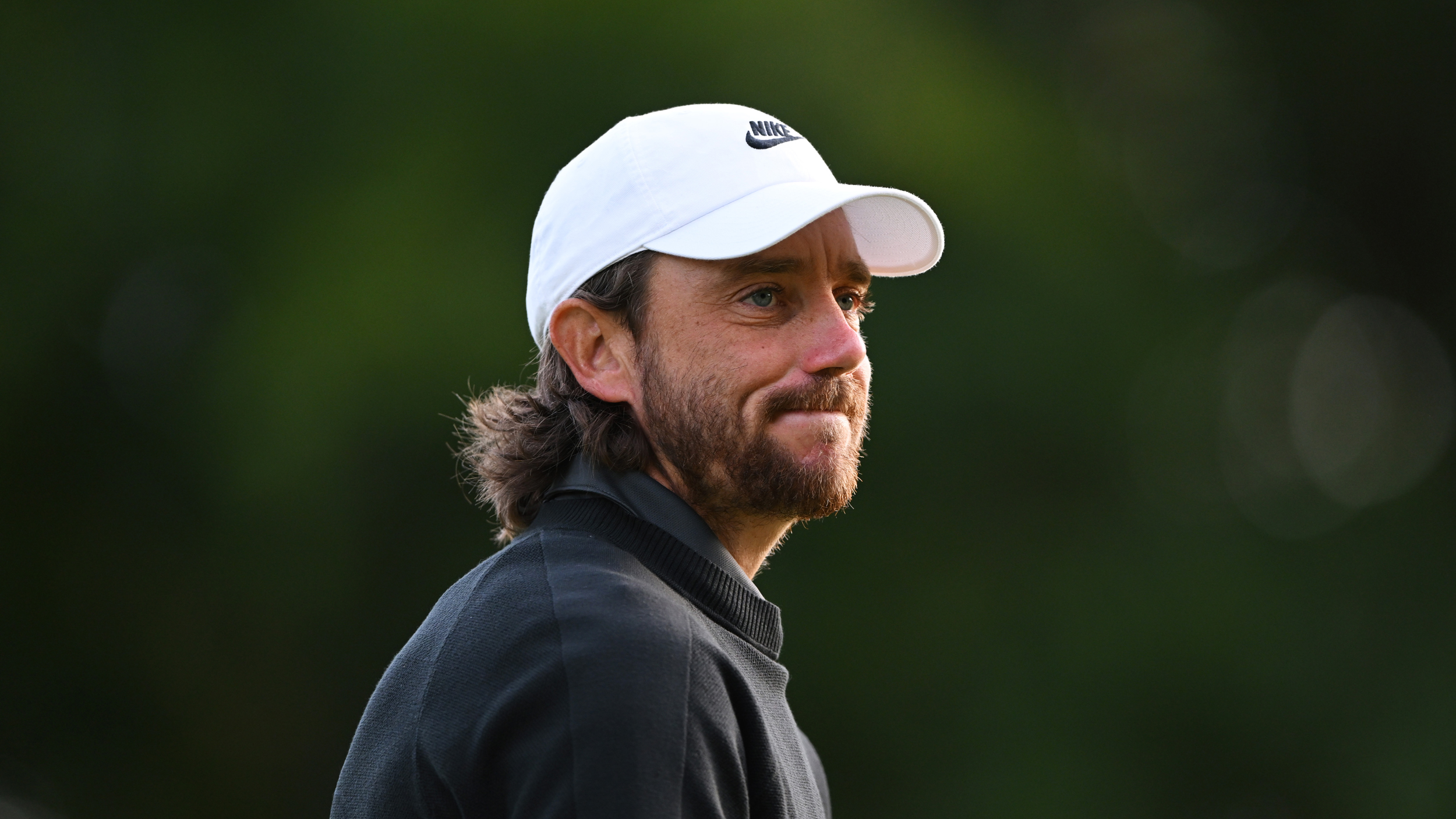 Tommy Fleetwood smiles during the 2025 BMW PGA Championship