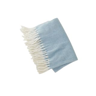 Upwest Fireside Fleece Throw Blanket in baby blue with white fringes