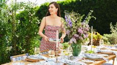 Hill House Home founder Nell Diamond setting an outdoor tablescape with tableware from her brand's new collaboration with Williams Sonoma 