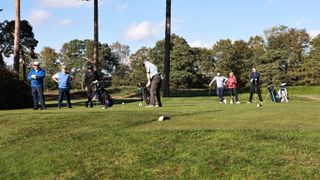 Players on tee