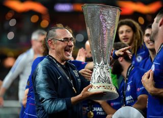 Maurizio Sarri celebrates with the Europa League trophy after Chelsea's win over Arsenal in the 2019 Europa League final.