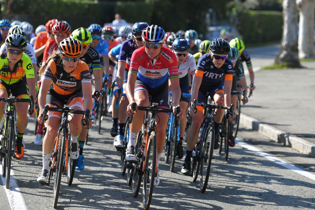 Karol-Ann Canuel and Chantal Blaak in the peloton