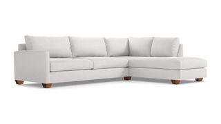 A white sleeper sectional from Apt2B