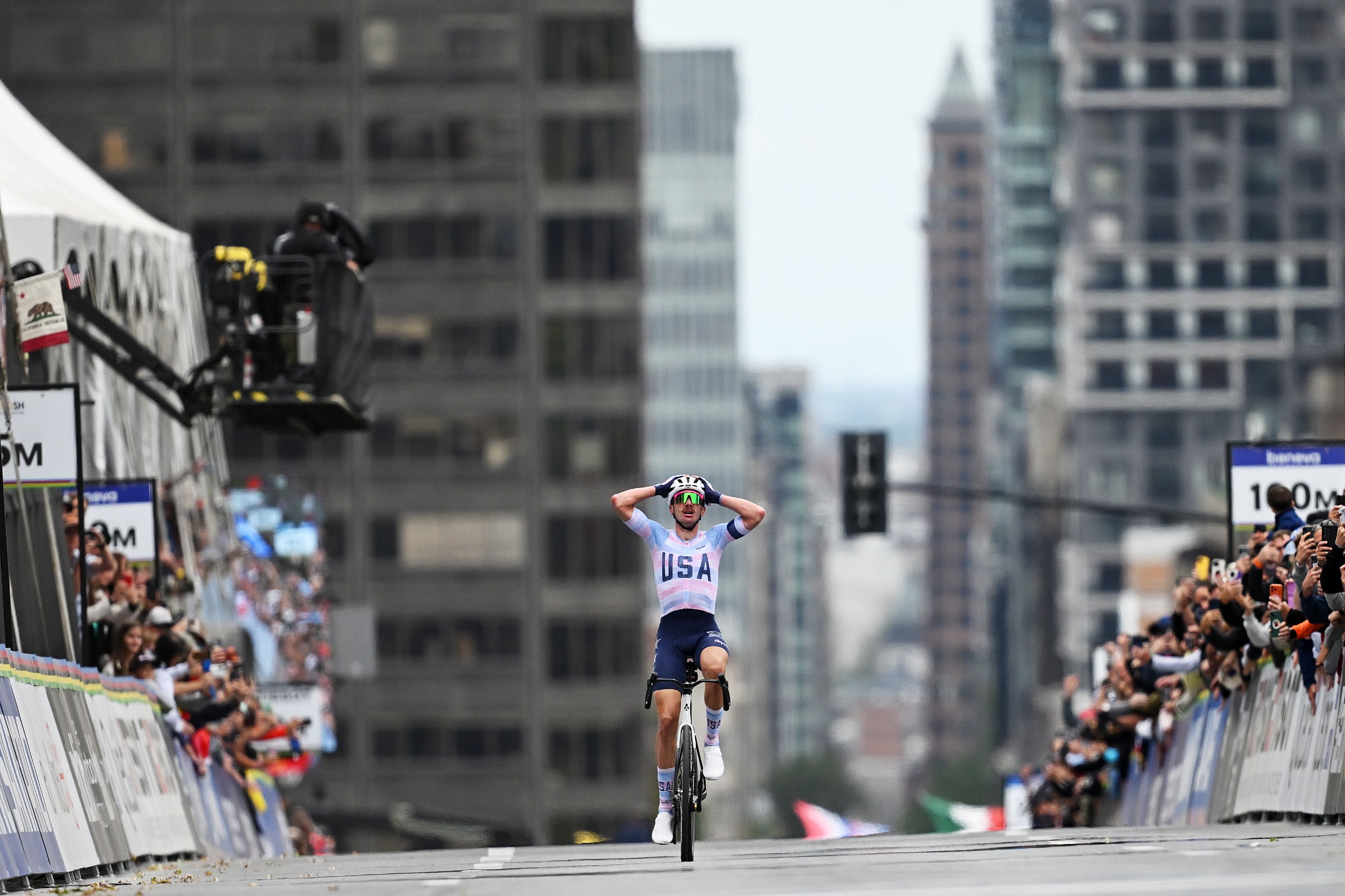 Brandon McNulty celebrates winning the World Championship road race 2026