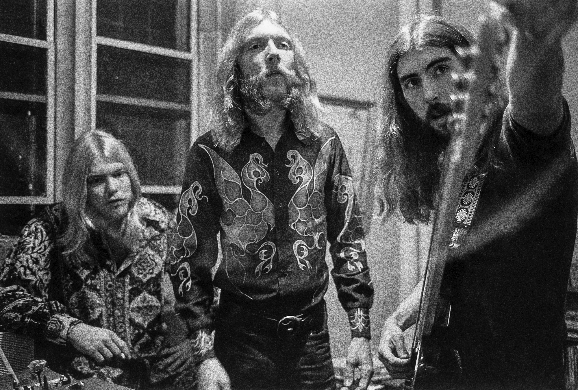 (from left) Gregg Allman, Duane Allman, and Berry Oakley backstage before the Allman Brothers' performance at the Sitar on October 17, 1970 in Spartanburg, South Carolina.