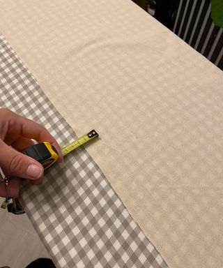 measuring tape on a piece of fabric