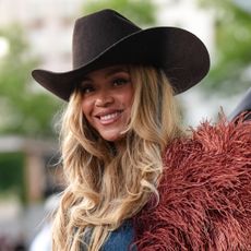 Beyoncé makes a surprise appearance at the Louis Vuitton Spring 2026 men's show in a denim jumpsuit 